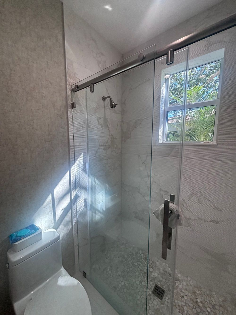 Custom walk-in shower conversion by H&H Signature Renovations